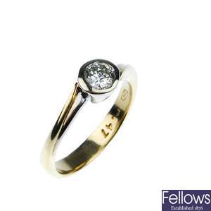 An 18ct gold single stone diamond ring of some