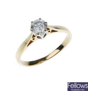An 18ct gold single stone diamond ring of some