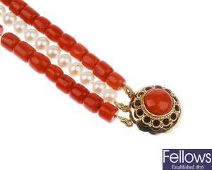 A coral and pearl three row bracelet with a
