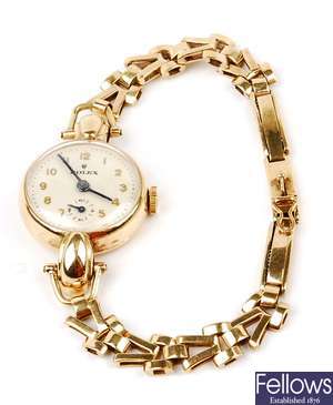 ROLEX - a lady's 9ct gold circular watch with