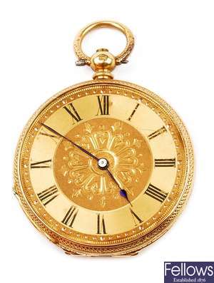A gold open face key wind pocket watch, glass