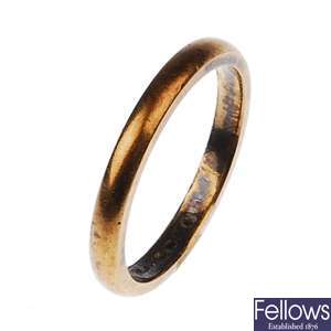 A 22ct gold band ring. Weight - 3.90 grams.