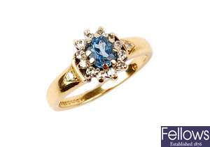 An 18ct gold oval blue topaz and diamond cluster