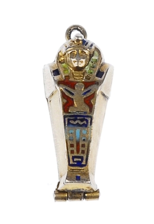 A Continental silver gilt sarcophagus charm of a