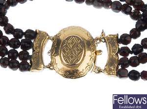 A four row faceted garnet bead bracelet with