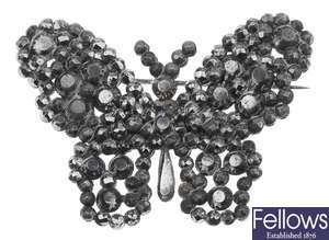 A cut steel brooch in the form of a butterfly,