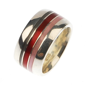 A number of silver wide band rings, each with red