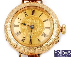 A 9ct gold cased watch with roman numerals and