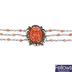 A coral and seed pearl bracelet.