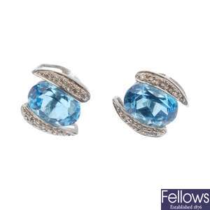 18ct white gold blue topaz and diamond stud earrings.