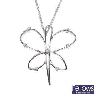 18ct white gold diamond set butterfly pendant.
