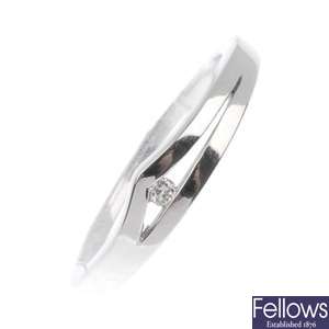 Platinum split design diamond ring.