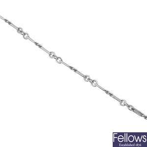 9ct white gold twisted fetter and three link bracelet.