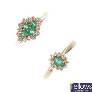 Two 18ct gold emerald and diamond cluster rings.