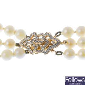 A three-strand cultured pearl bracelet.
