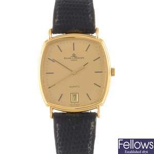 An 18k gold Baume & Mercier wrist watch.