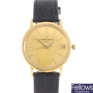 An 18k gold Eterna-Matic wrist watch.