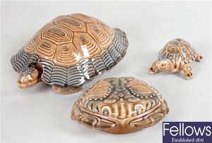 A selection of Wade tortoise ornaments and a selection of Wade pin dishes and ashtrays