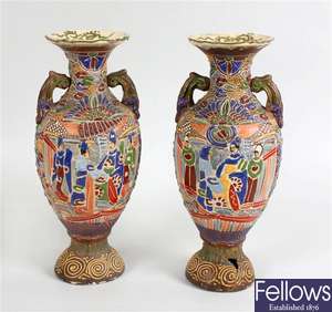 A pair of Satsuma pottery twin handled baluster vases and three other Imari vases