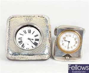 A London 1935 hallmarked silver cased folding travel clock and a Goliath pocket watch