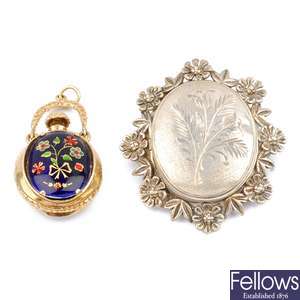 A 9ct gold and enamel scent bottle and a silver brooch.