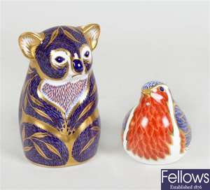 A Royal Crown Derby ornament modelled as a Koala and a similar ornament modelled as a bird