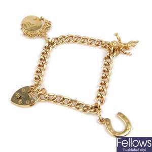 (44096) A 9ct gold charm bracelet