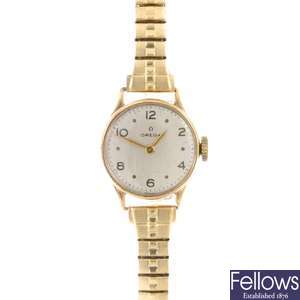 A group of four 9ct gold ladies Omega wrist watches.