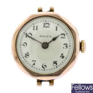 A pair of 9ct gold manual wind lady's Rolex watch heads.