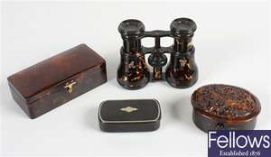 A pair of opera glasses, two papier mache snuff boxes and a pill box