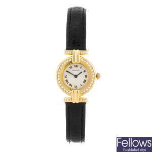 An 18k gold quartz lady's Cartier wrist watch.