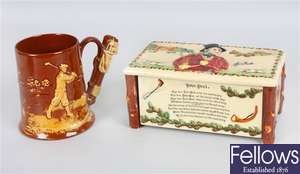 A Crown Devon pottery musical box and a Dartmouth mug