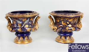 A pair of late 19th century pottery vases
