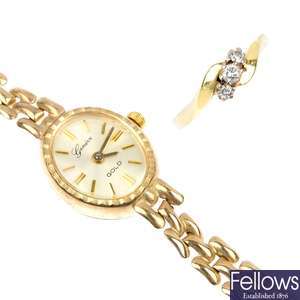 A 9ct gold ladies watch and 18ct gold diamond three-stone ring.