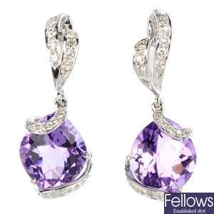 A pair of 18ct gold amethyst and diamond ear pendants.
