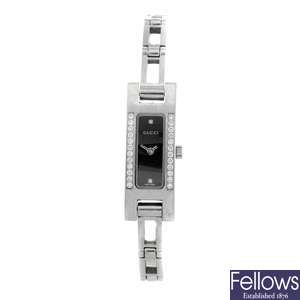 (307081053) A stainless steel quartz lady's Gucci bracelet watch.