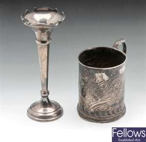 Silver Christening mug and bud vase.