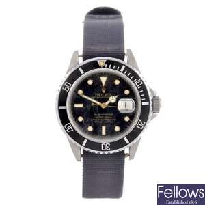 A Rolex Submariner wrist watch.