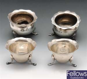 Two pairs of silver open salts.