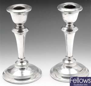 Pair of silver candlesticks.