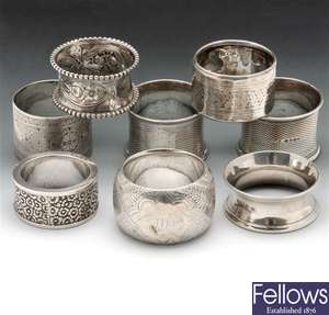 Pair of Victorian silver napkin rings, five other Victorian examples & a white metal napkin ring.