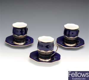 Early 20th century silver mounted Coalport china coffee cups & saucers.