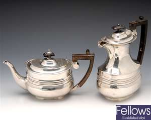 Edwardian silver teapot and hot water pot.