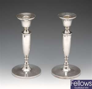 Matched pair of modern silver candlesticks.
