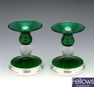 Pair of modern silver mounted green glass candlesticks.