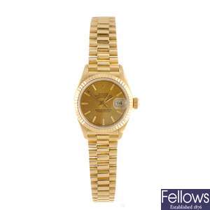 A 18k gold automatic lady's Rolex Datejust bracelet watch