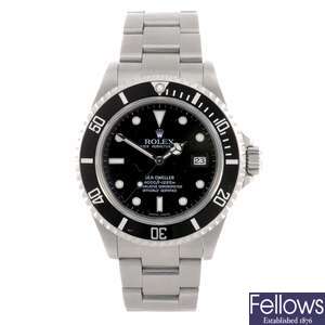 Stainless steel automatic Rolex Sea Dweller bracelet watch.