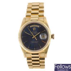 An 18k gold automatic gentleman's Rolex Oyster Perpetual Day-Date bracelet watch.