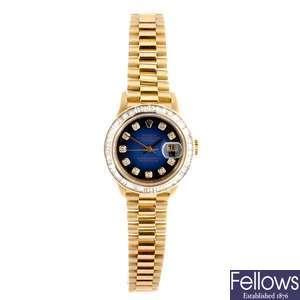 An 18ct gold automatic lady's Rolex bracelet watch.