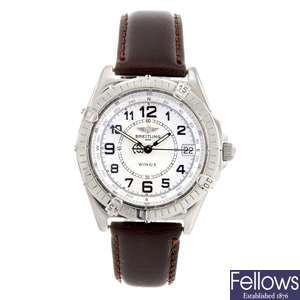 A stainless steel quartz gentleman's Breitling wrist watch.